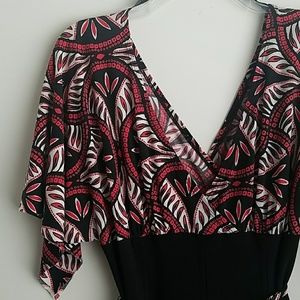 Red, black, and white faux wrap dress